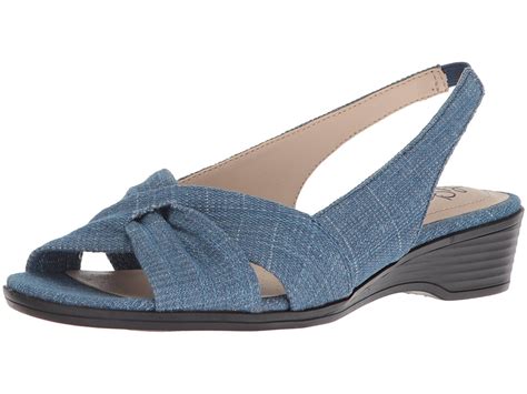 Fabric upper with an open toe, slip-on fit, stylish straps and woven heel. . Lifestride womens sandals